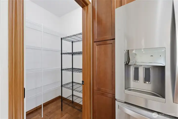 A roomy walk in pantry.