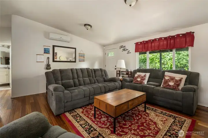 Living room with HP mini split and vaulted ceilings. Living room with HP mini split and vaulted ceilings.