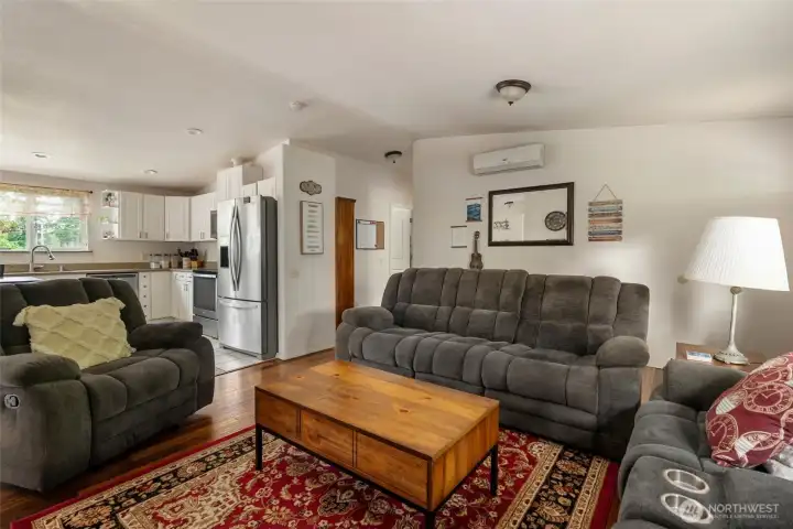 Open concept living room to kitchen. Open concept living room to kitchen.