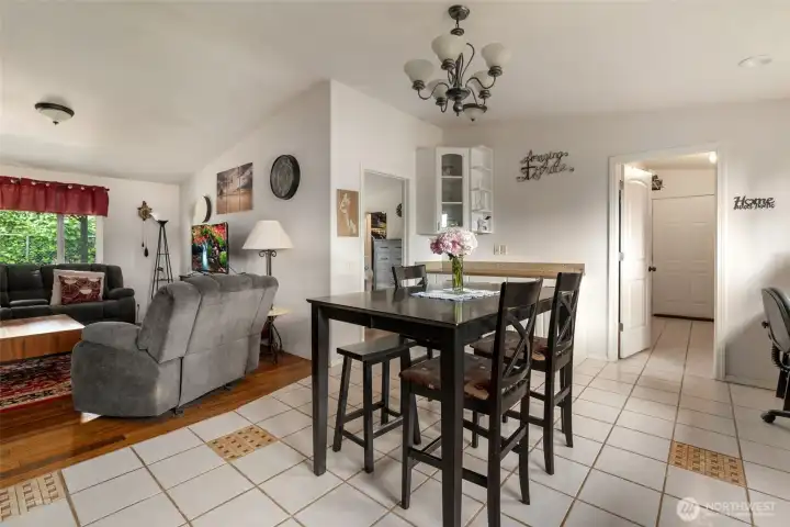 Dining area in the kitchen. Note the tile floors. Dining area in the kitchen. Note the tile floors.
