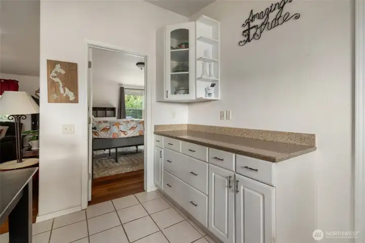 More counter space. Door to primary bedroom. More counter space. Door to primary bedroom.