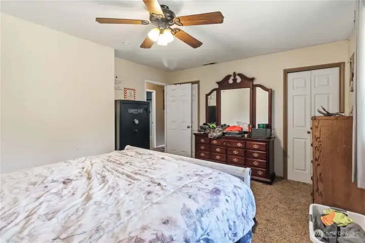 Dual closets in primary bedroom. Dual closets in primary bedroom.