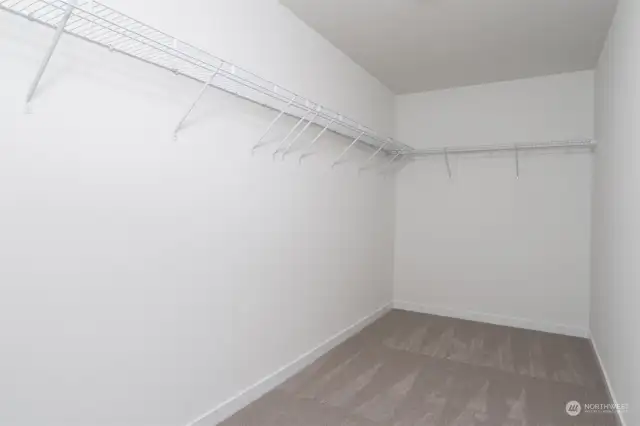 Upstairs primary walk-in closet