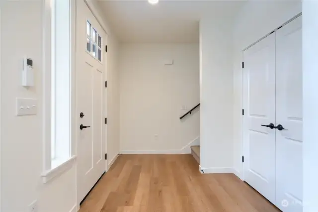 Entrance and hallway closet of primary dwelling.