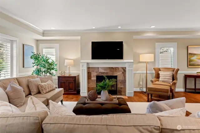 A gas fireplace is the center-piece to the open-concept living and dining areas