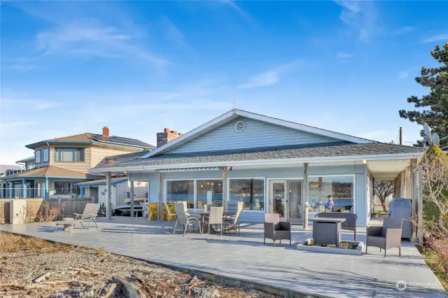 Water side of house with  deck