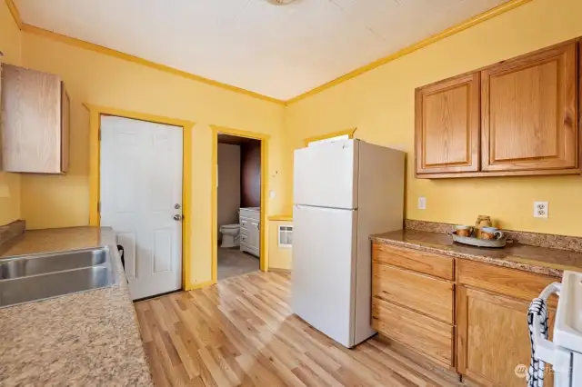 Closed door to back deck and bathroom.