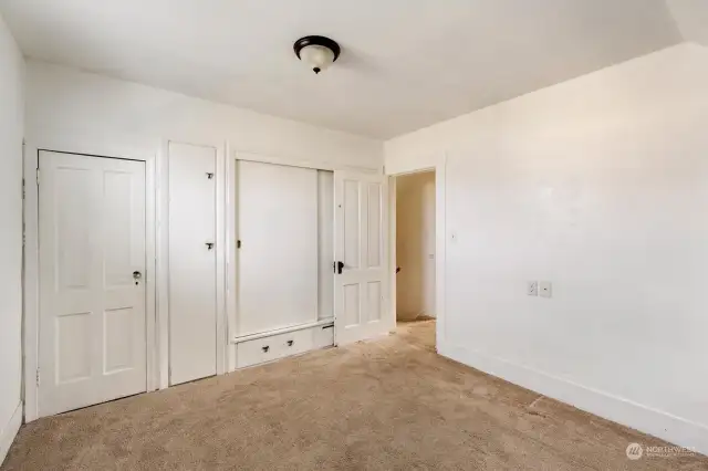 Original built-in drawers/storage plus closet.