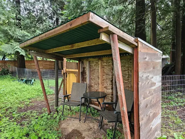 Lean-to by the river - sit and enjoy the view sheltered from the rain