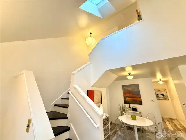 Skylights flood the living room and dining room.