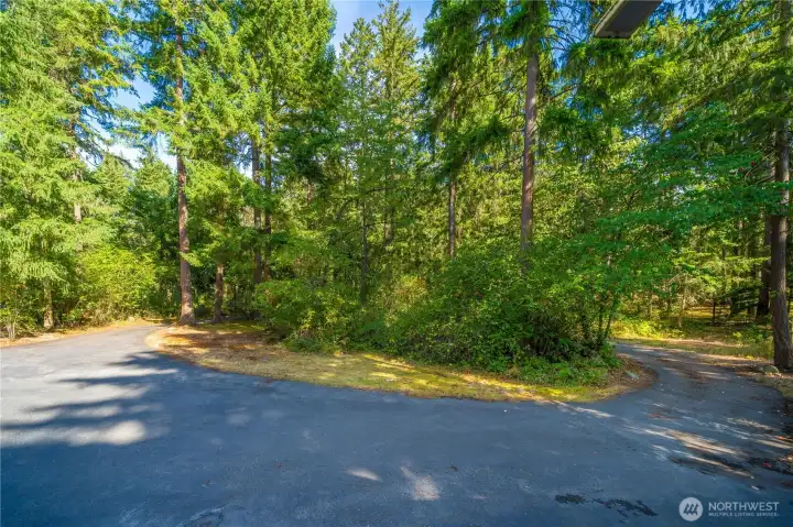 Circular drive makes access a breeze, while providing privacy and noise reduction from the road.
