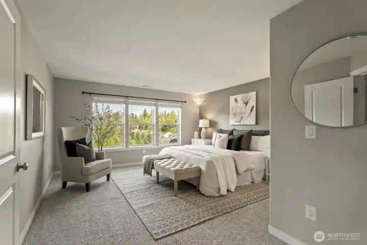Large primary suite offering beautiful views to wake up to every morning, right from the comfort of your bed.(Staged photo)