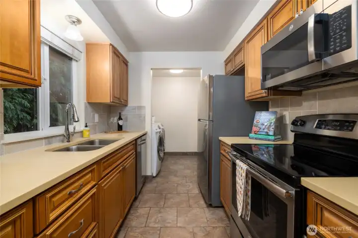 The kitchen has plenty of storage and counter space.