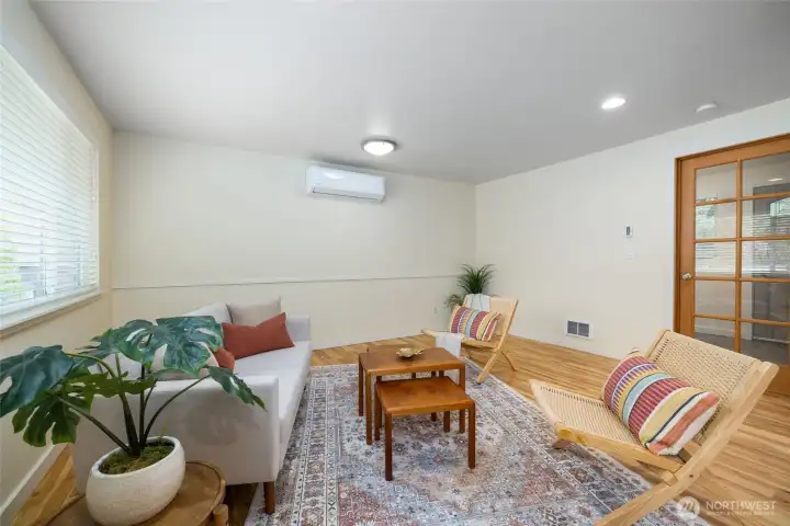 The large living room has great abundant light.