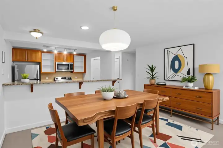 Space for dining adjacent to the breakfast bar and kitchen. The flow in this room is great for entertaining and living the life you deserve.