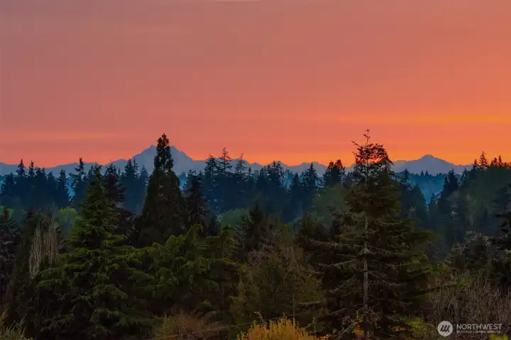 Panoramic outlook with dramatic sunset views over the Pacific Northwest landscape.
