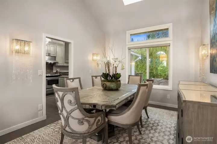 Dining area adjoins the beautifully updated chef's kitchen.