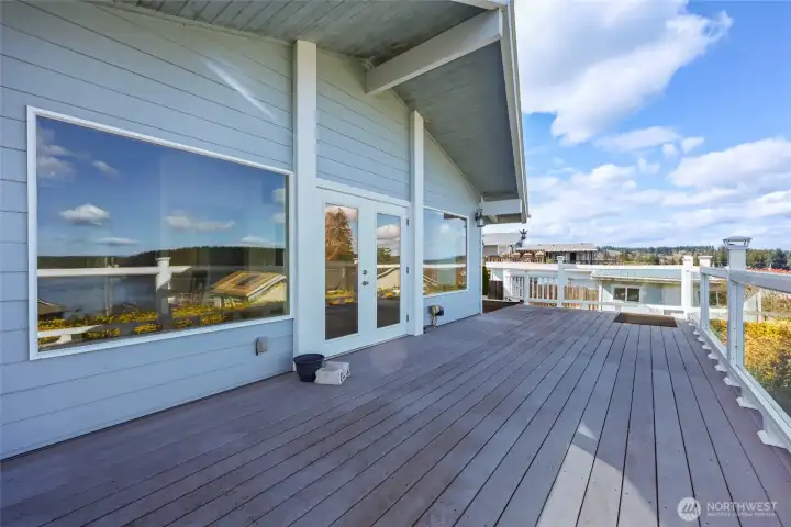 Deck off the great room. Nice reflections of the view on the windows