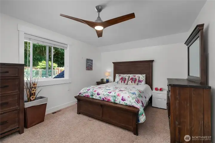 Upstairs 3rd bedroom with views of the backyard.