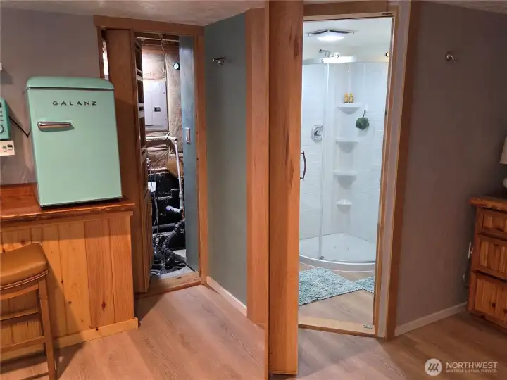 Hidden 2 DOORS are Now Open. Left Wine Rack opens to Mechanical - Storage room, And Bookcase opens to 3/4 Luxury Bathroom - This is in the basement location.