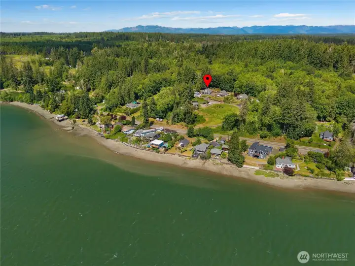 Drone shot of the home from the water view.