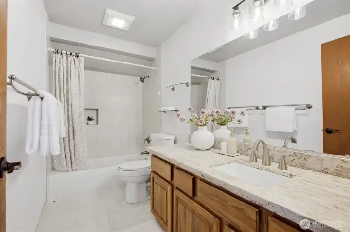 Hallway bathroom upstairs with heated floor, new lighting and quartz countertop! Hallway bathroom upstairs with heated floor, new lighting and quartz countertop!