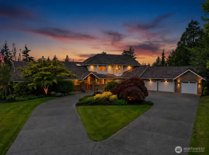 Circular drive featuring fountain and mature Japanese maple Circular drive featuring fountain and mature Japanese maple