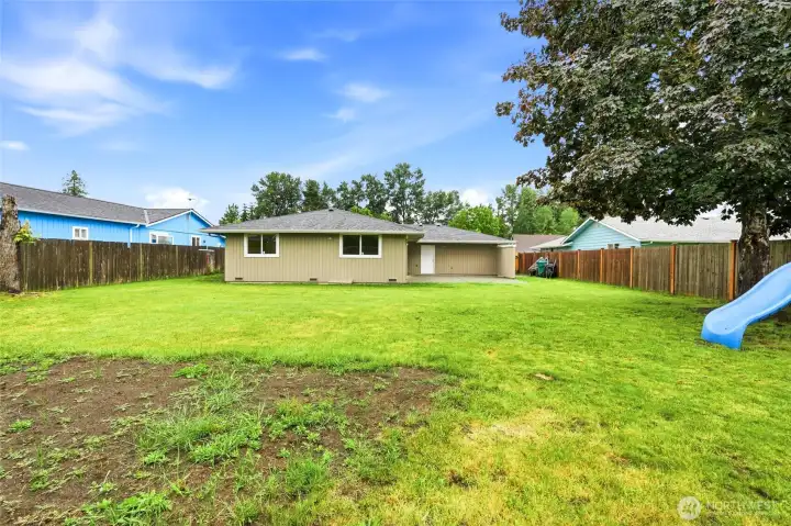 Secure perimeter privacy fencing, and ample room for gardening, play, or future additions.
