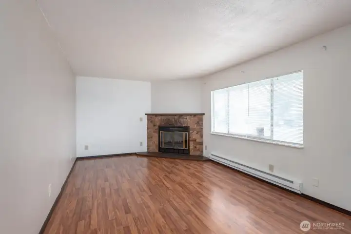 Living room with wood burning fireplace