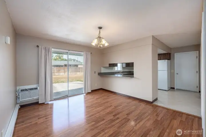 Dining area with slider to backyard