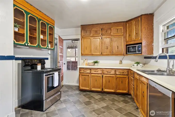 Kitchen.  Door at back leads to the covered deck