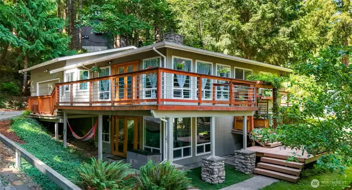 Exterior view showcasing the wraparound composite deck.