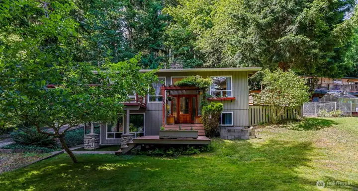 Sunny front yard and an expansive double lot.