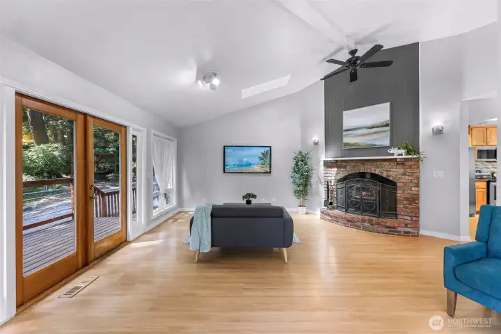 Living room opens directly to the wraparound deck.