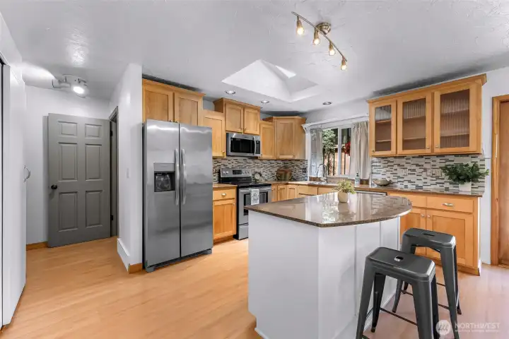 Updated kitchen with island seating.