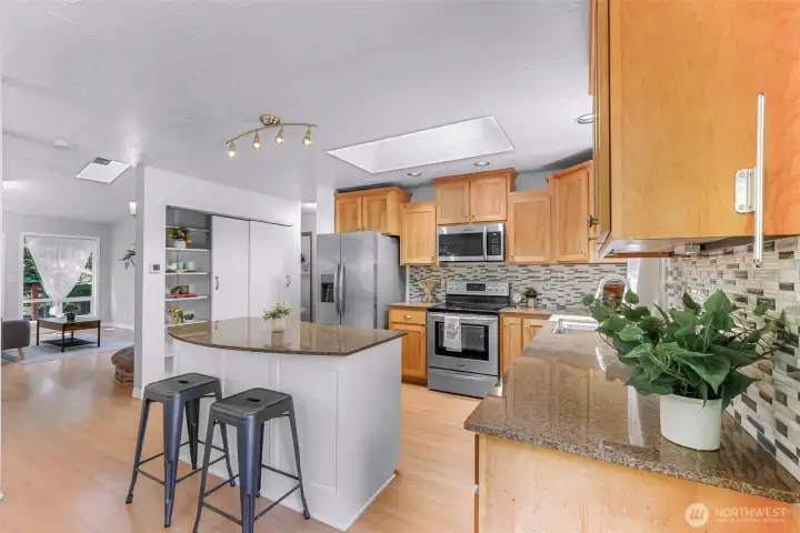 Kitchen looks into the main living area.
