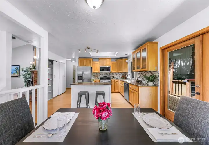 View from the dining area into the kitchen.