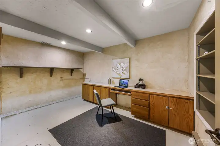 Another bonus room with built in desk and shelving.