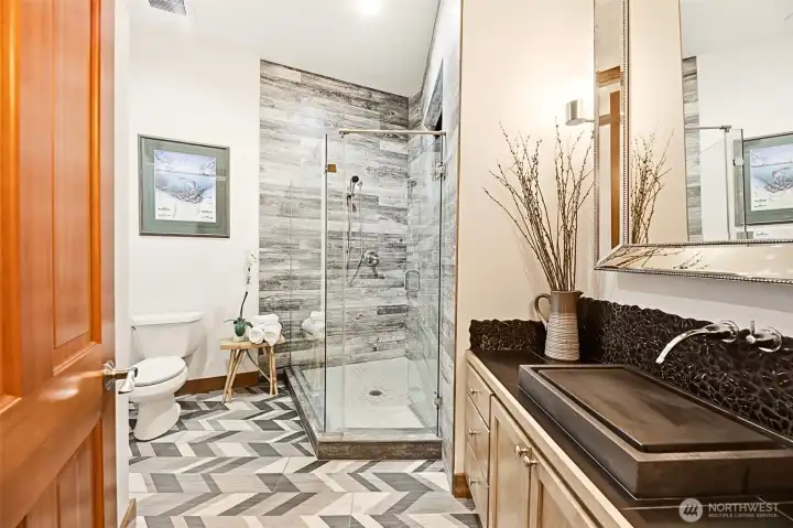 Beautifully updated main floor 3/4 bathroom. Beautifully updated main floor 3/4 bathroom.