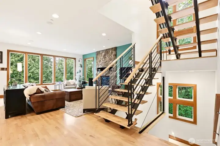 Beautifully designed modern staircase allows main floor to feel open and bright. Beautifully designed modern staircase allows main floor to feel open and bright.