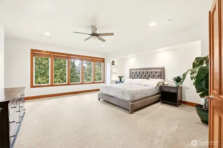 Upstairs primary bedroom is a true retreat with privacy and lake views. Upstairs primary bedroom is a true retreat with privacy and lake views.