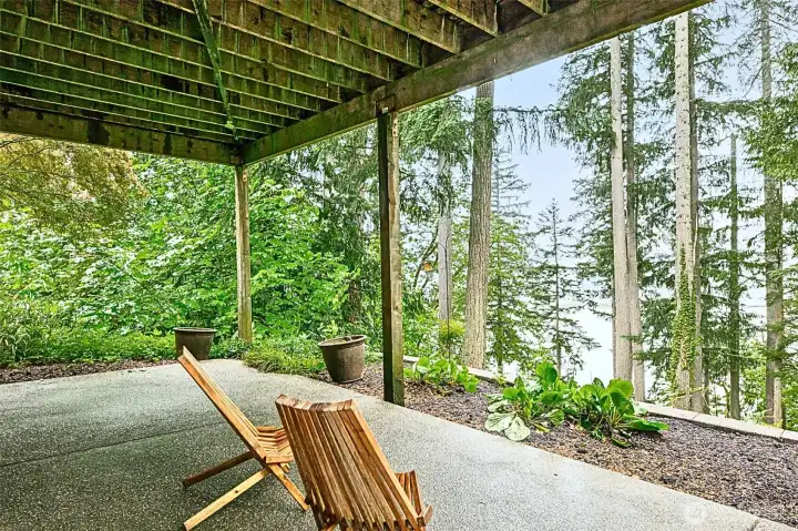 Surrounded by nature on this private patio looking out to the lake. Surrounded by nature on this private patio looking out to the lake.