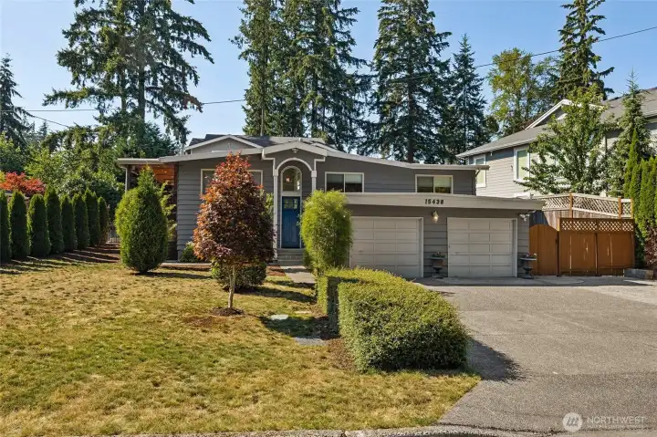This exquisite 5 bedroom 4 bath home was thoughtfully reimagined by a custom home builder.  Perfectly set up for multigenerational living with with kitchens, primary suites and even laundry on each floor.