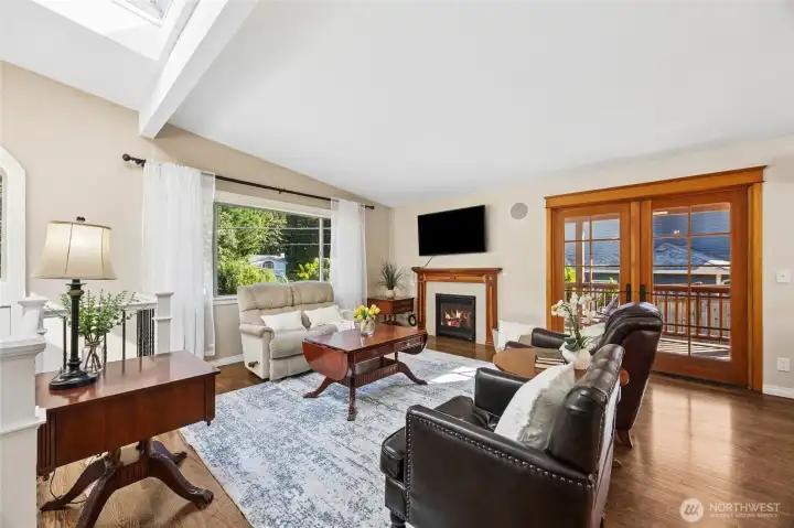 Living room with gas fireplace.   Note the french doors to the covered deck.