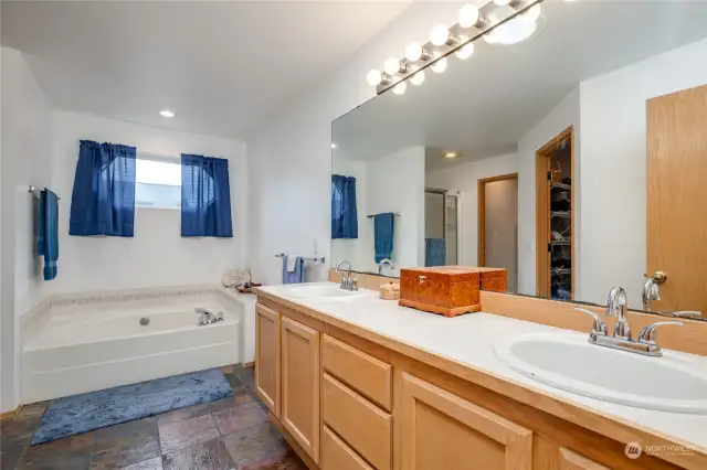 5-Piece primary bath has gorgeous slate tile flooring