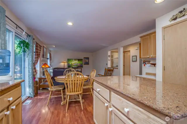 Kitchen overlooks breakfast nook & family room. Note the built-in desk!