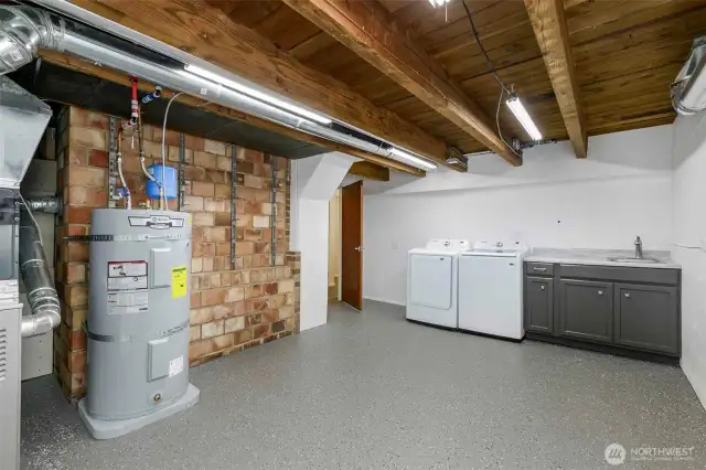 Spacious laundry room with extra storage.