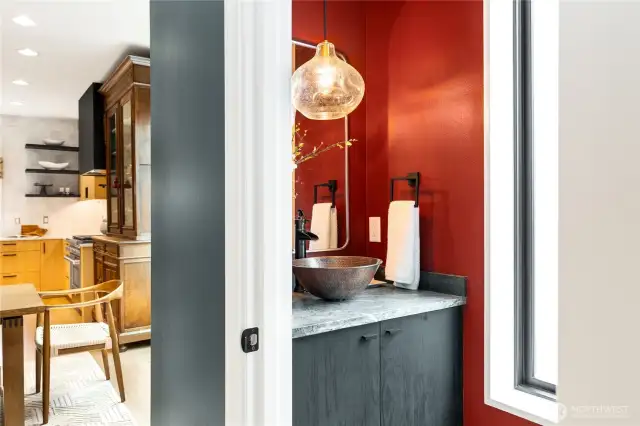 Main level powder room. Copper sink. All new fixtures.