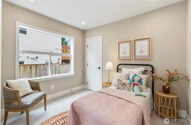 Secondary Bedroom with Views of Downtown Seattle and Port of Seattle