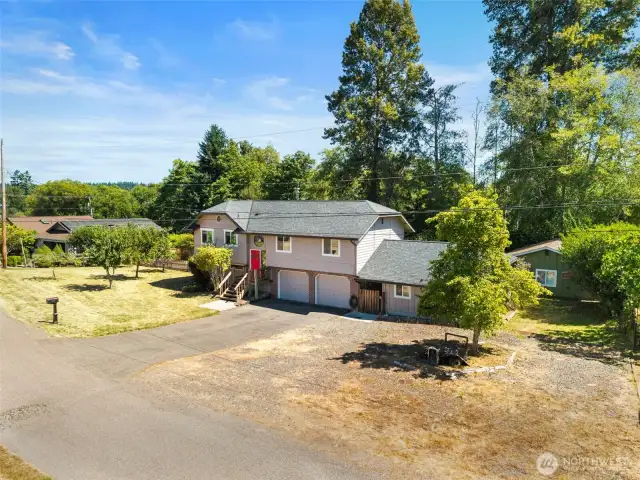 The home was thoughtfully designed with a breezeway that seamlessly connects to a flexible bonus room. A detached 2-car garage with a convenient workshop is nestled in the large backyard, perfect for projects or hobbies. Imagine the possibilities in this sprawling outdoor space!